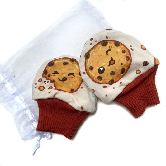 Gorgeous little baby mittens in a bold happy cookie print, perfect for baby gifts, growing hands to give plenty of movement and to match outfits. 