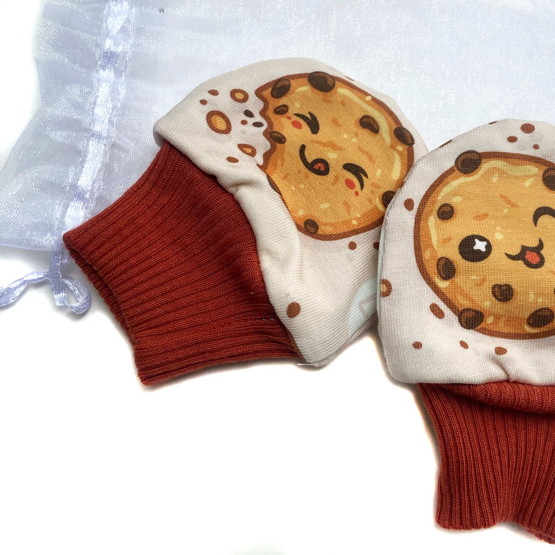 Gorgeous little baby mittens in a bold happy cookie print, perfect for baby gifts, growing hands to give plenty of movement and to match outfits. 