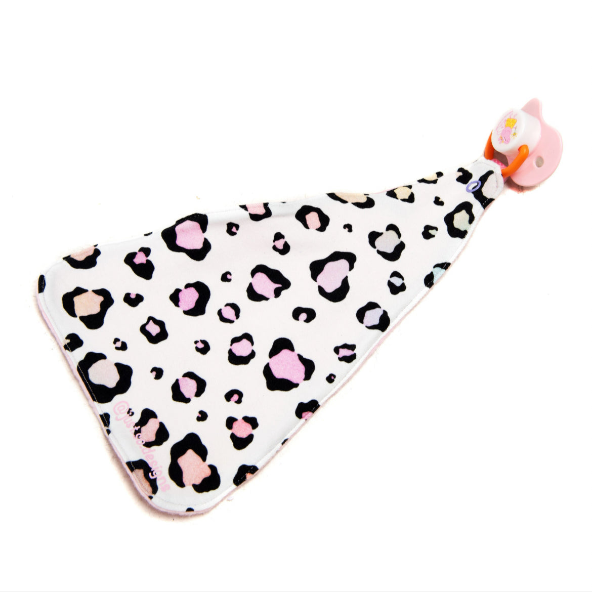 Handmade dummy comforter is the perfect soothing companion. Crafted from soft, baby safe jersey cotton and fleece. Keeps dummies and pacifiers close whilst offering cuddly comfort for little ones.