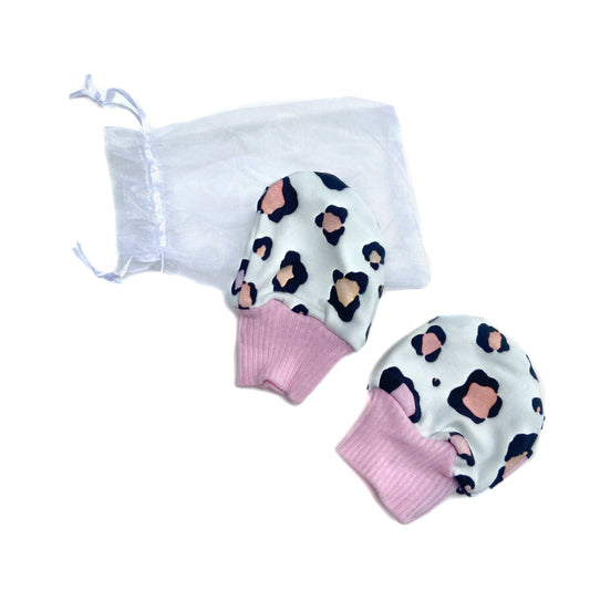 Gorgeous little baby mittens in a bold pastel leopard print, perfect for baby gifts, growing hands to give plenty of movement and to match outfits. 