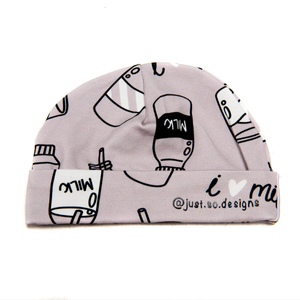 A cute little newborn hat with a monochrome neutral I Love Milk Print to match the comfy romper