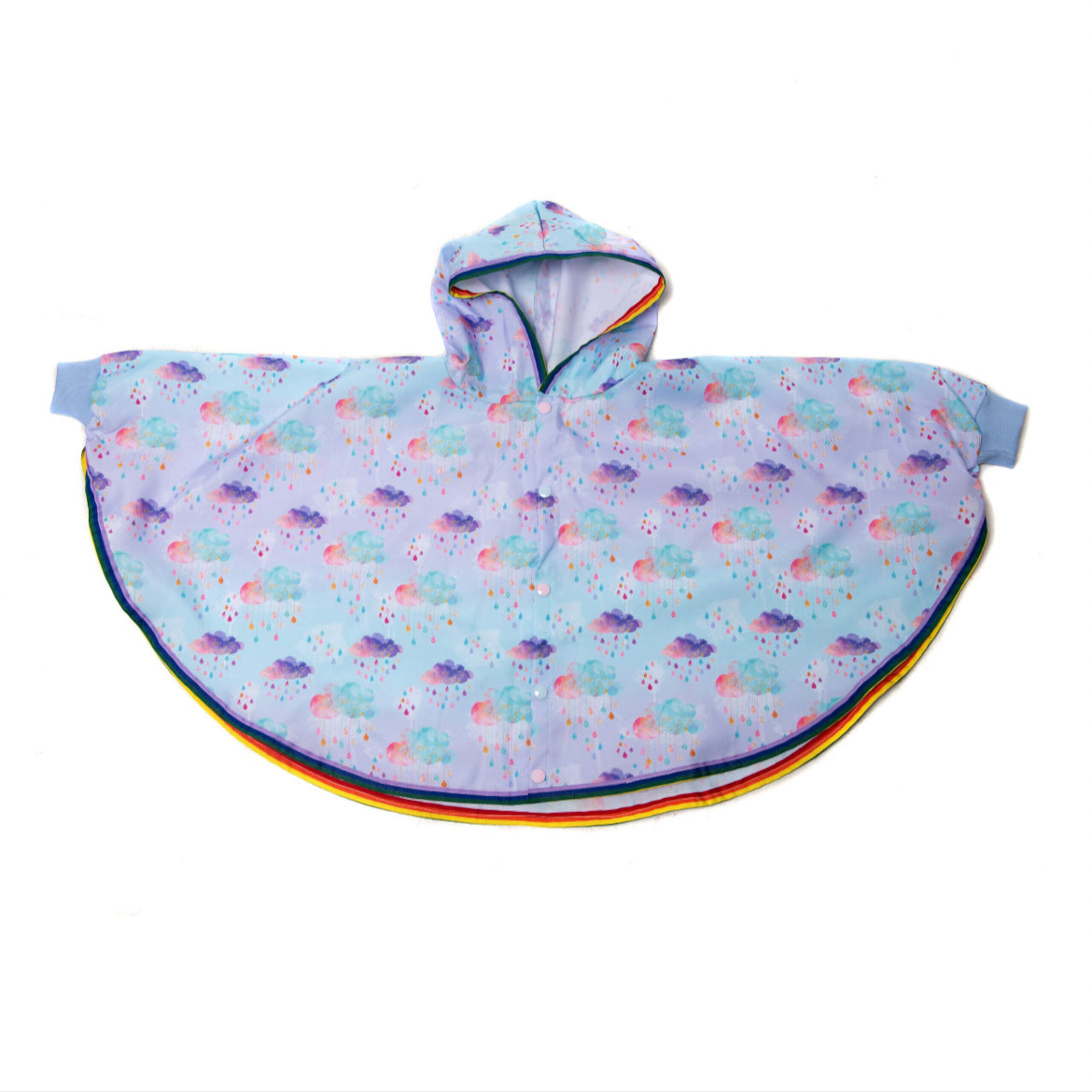Keep little adventurers dry in style with this handmade waterproof cape, featuring a playful umbrella print, rainbow trim and roomy fit for carefree outdoor fun in any weather.