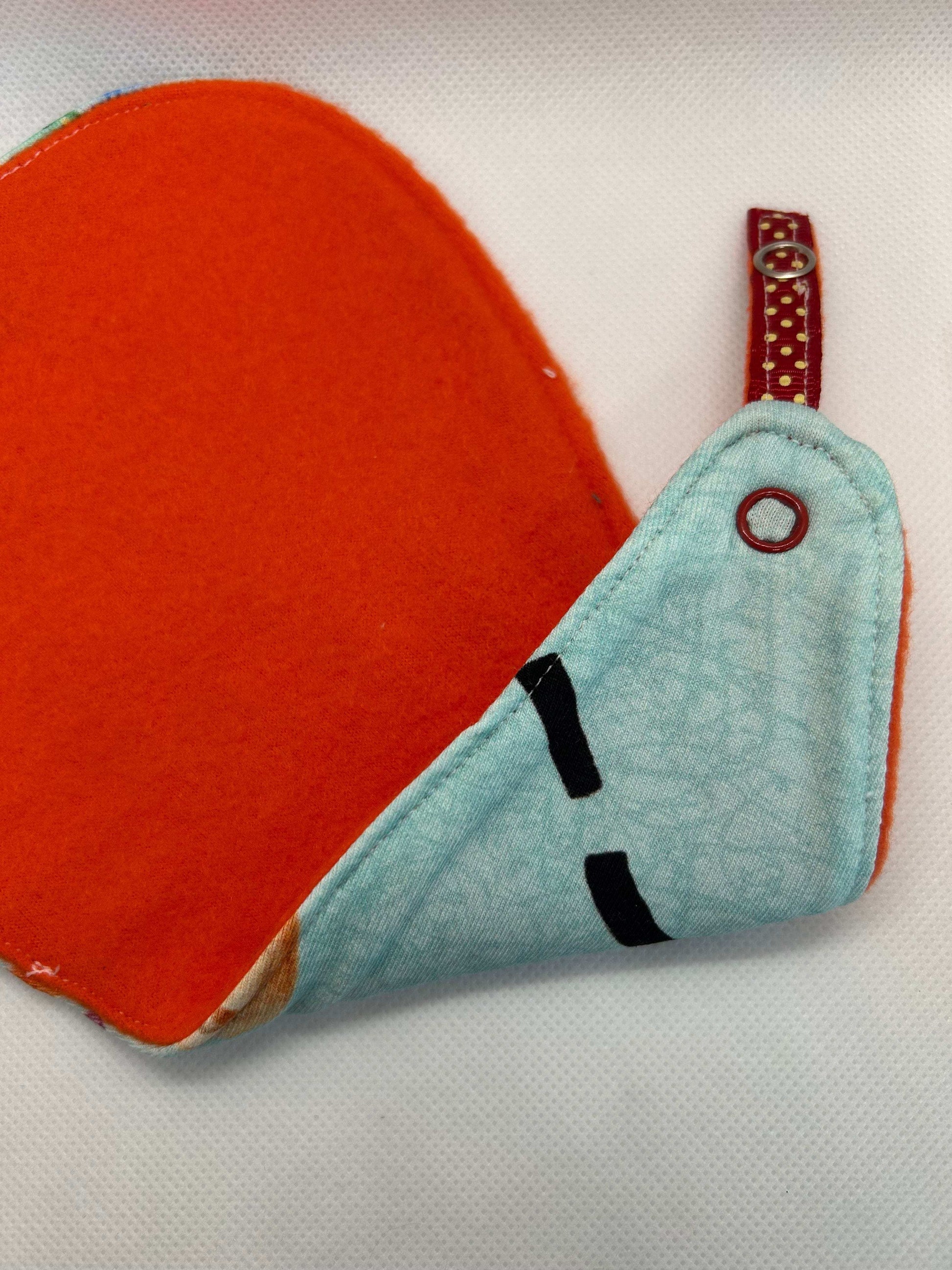 Handmade dummy comforter is the perfect soothing companion. Crafted from soft, baby safe jersey cotton and fleece. Keeps dummies and pacifiers close whilst offering cuddly comfort for little ones.